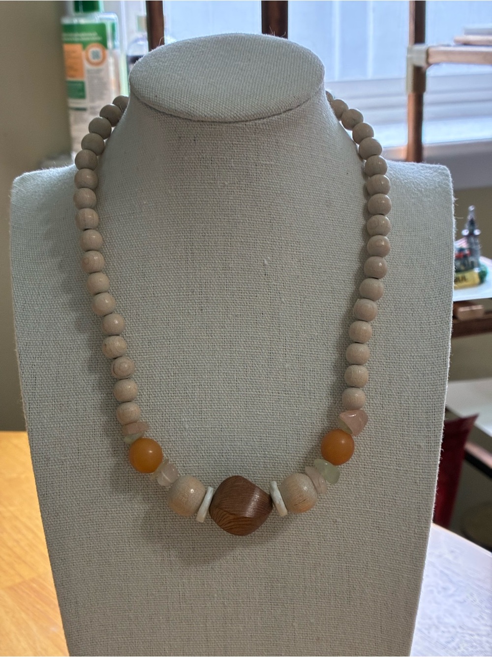 The item in the image is a vintage beaded statement necklace.